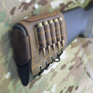Compact buttstock sleeve with cheek pad and anti slide protective loop
