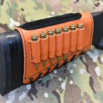Orange buttstock sleeve with ammo holders suede cheek pad