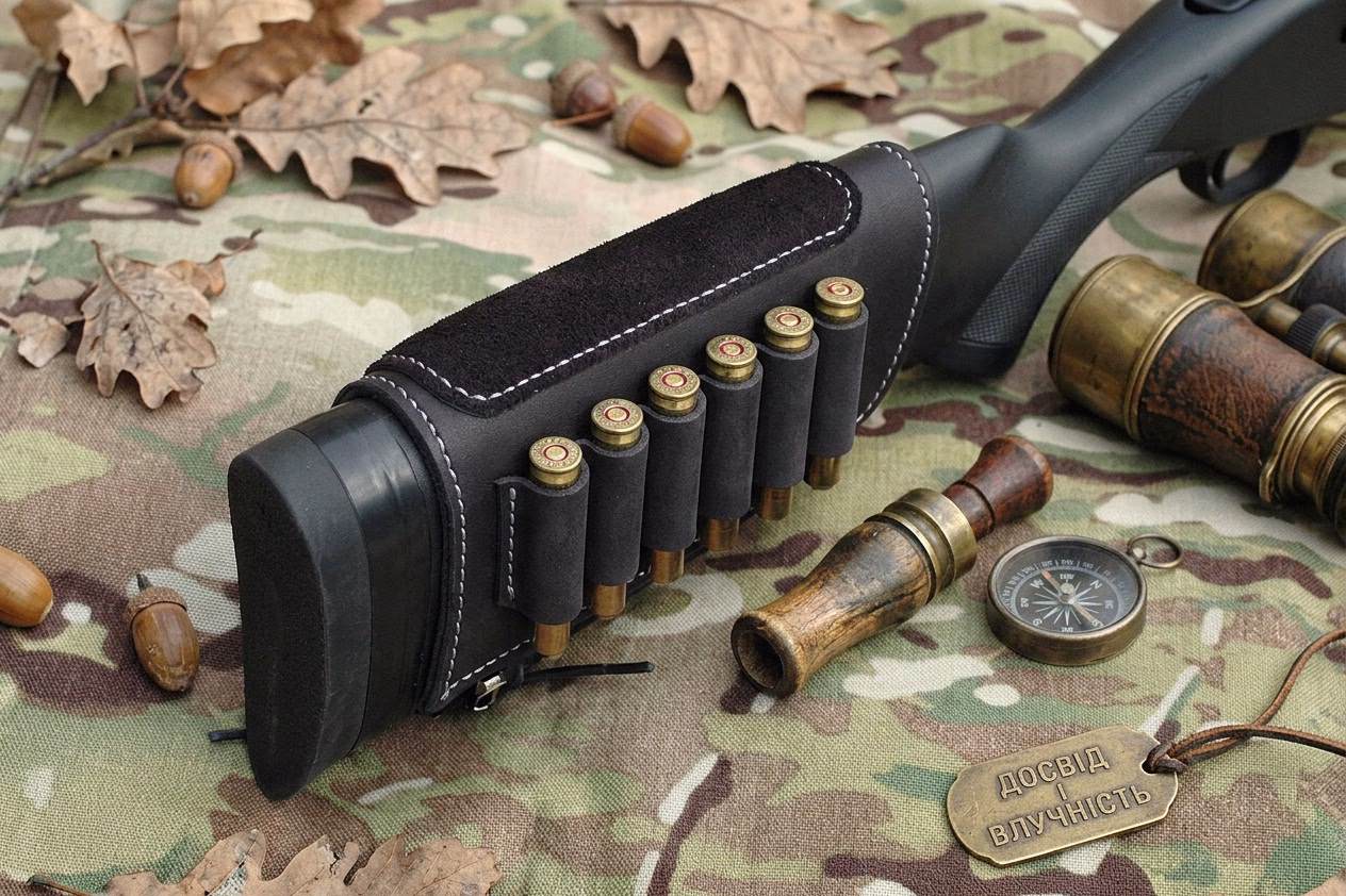Buttstock cartridge cuff with suede cheek pad